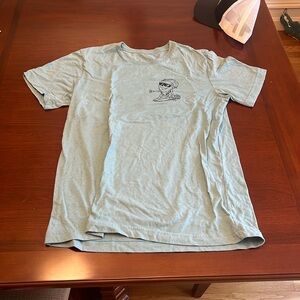 Pump House Surf Shop blue tee.